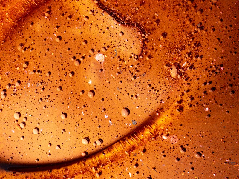 橙色的流动液体背景素材图片