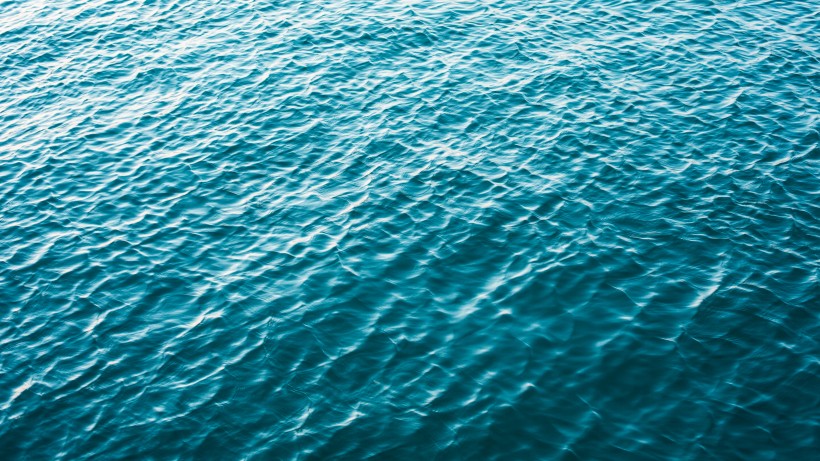 波光粼粼的水面图案背景图片