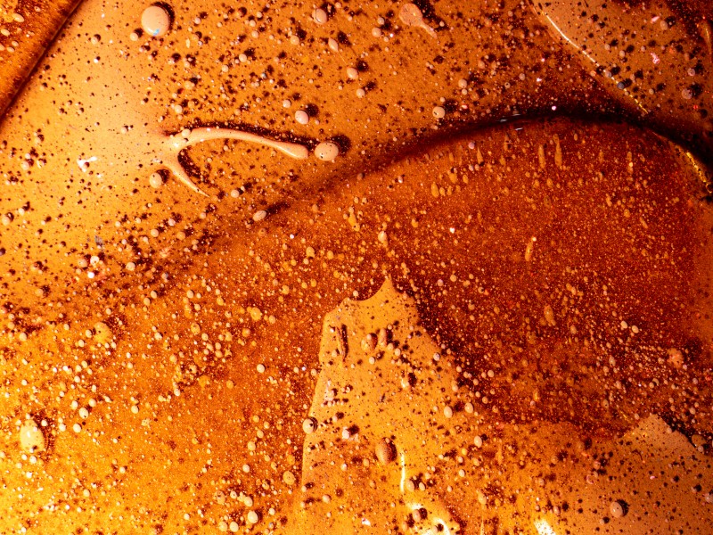 橙色的流动液体背景素材图片