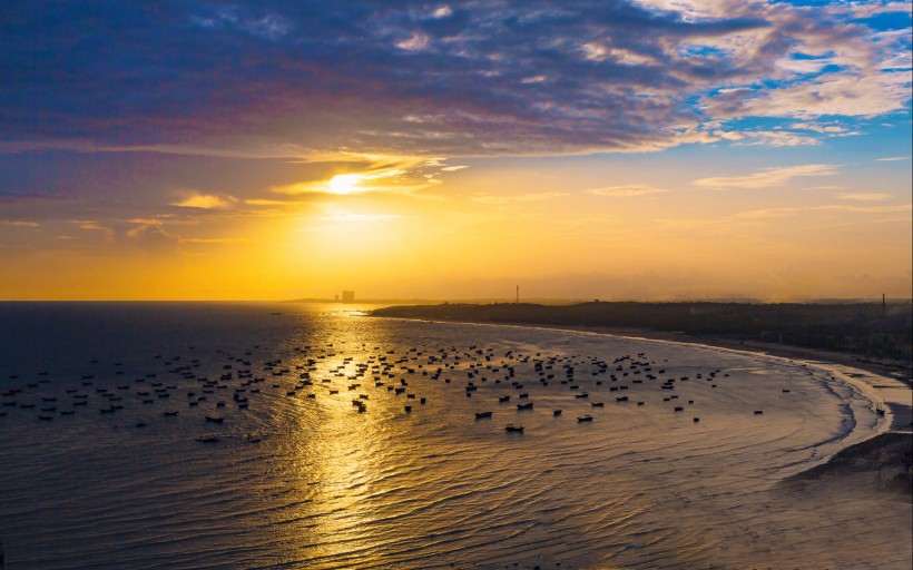 电白晏镜海湾夕阳美景图片