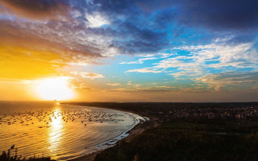 电白晏镜海湾夕阳美景图片