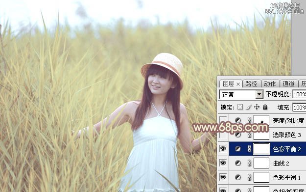 Photoshop給蘆葦中的美女加上唯美的韓系淡黃色
