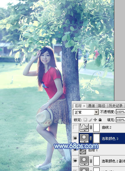 Photoshop給樹邊的女孩加上流行的淡調(diào)青藍色