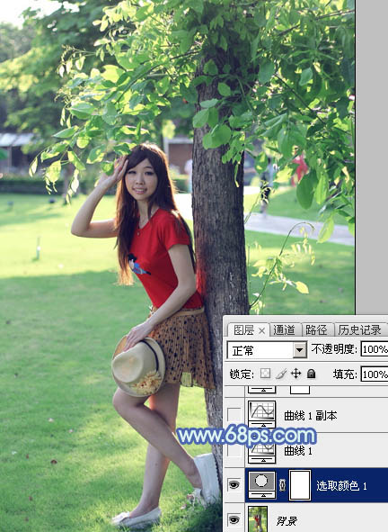 Photoshop給樹邊的女孩加上流行的淡調(diào)青藍(lán)色